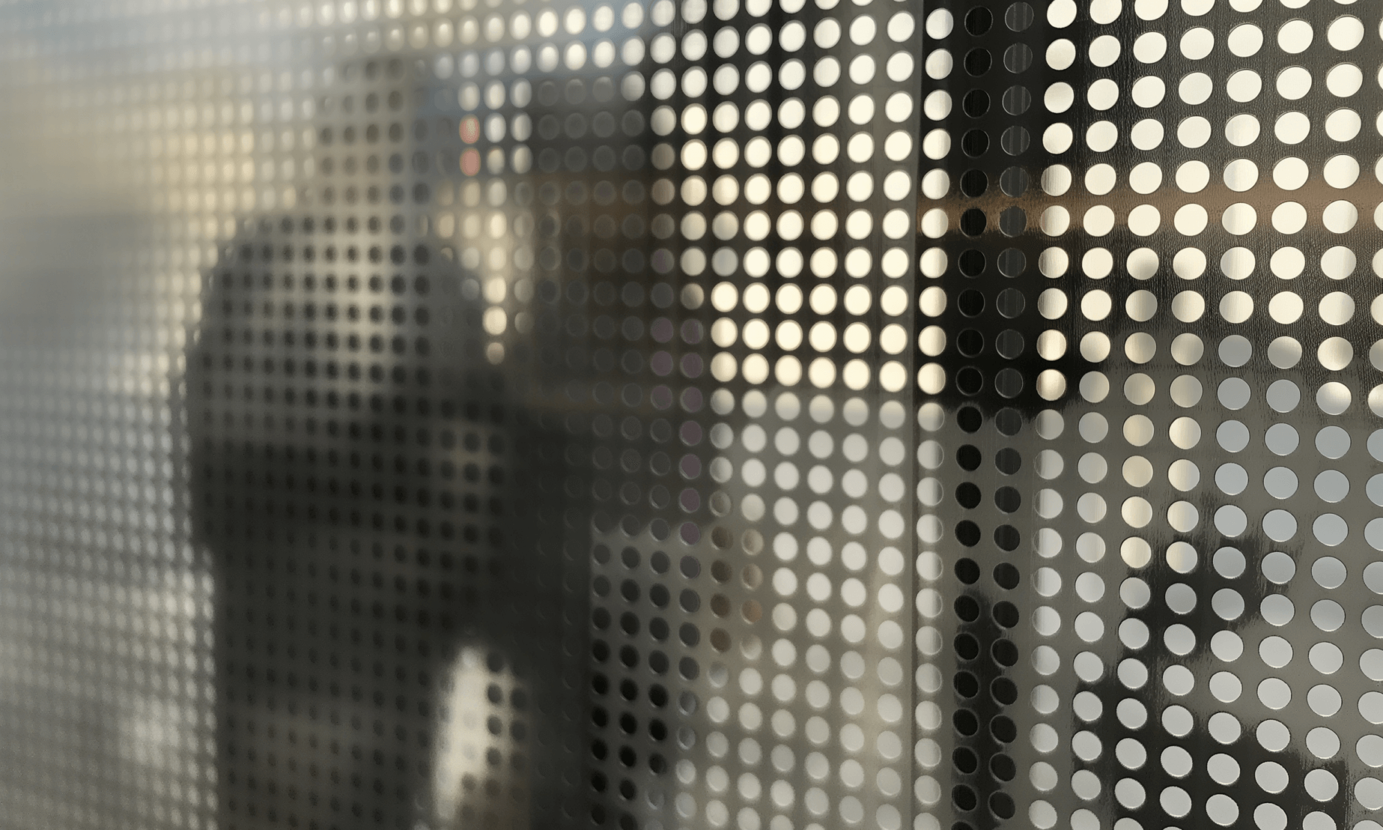 carletontorpin_A_closeup_of_the_window_screen_with_visible_smal_2d731491